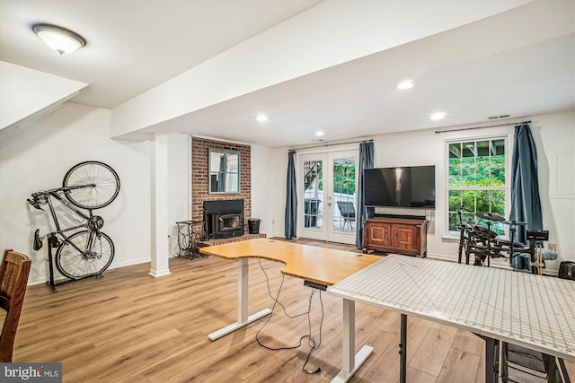 1559 Autumn Ridge Cir, Reston, VA 20194 - living room featuring french doors, wood finished floors, a wood stove, recessed lighting, and baseboards