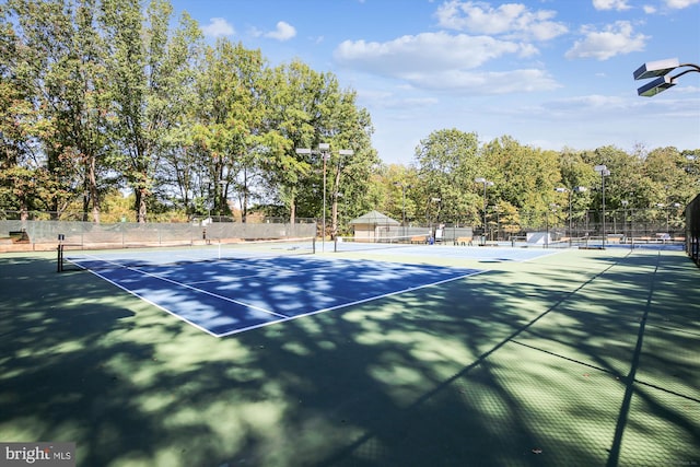 1559 Autumn Ridge Cir, Reston, VA 20194 - view of tennis court featuring fence, view of wooded area, and community basketball court