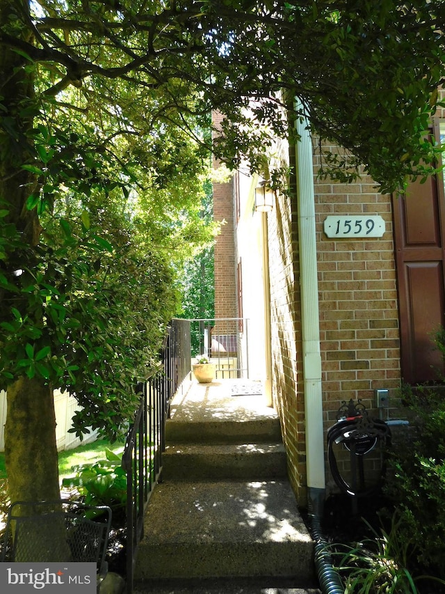 1559 Autumn Ridge Cir, Reston, VA 20194 - doorway to property with brick siding