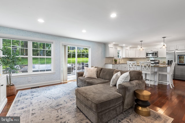 106 Debaran Ln, Bryn Mawr, PA 19010 - living room featuring dark wood-style floors, recessed lighting, and baseboards