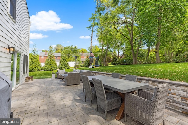 106 Debaran Ln, Bryn Mawr, PA 19010 - view of patio with a trampoline, outdoor dining space, and an outdoor living space