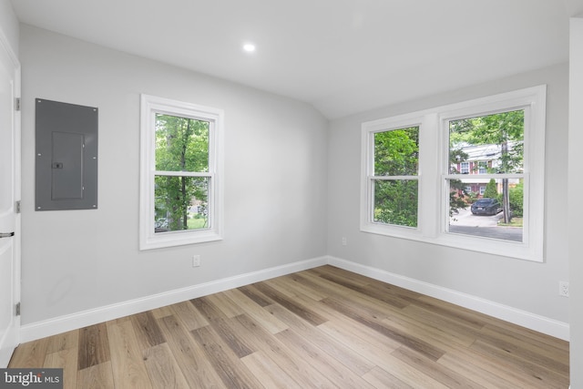 6005 Reed St, Landover, MD 20785 - empty room with electric panel, plenty of natural light, light wood-type flooring, baseboards, and recessed lighting