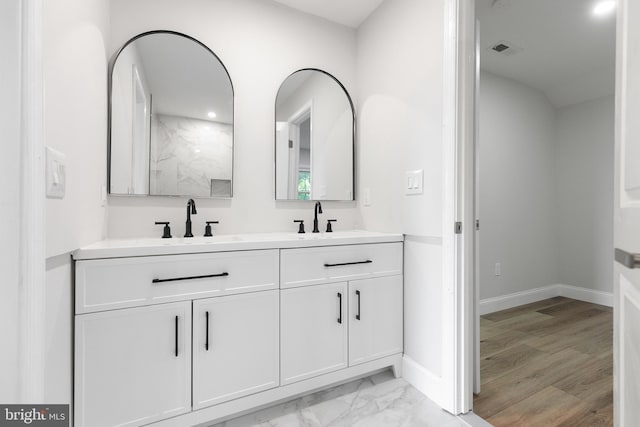 6005 Reed St, Landover, MD 20785 - full bath with double vanity, baseboards, and marble finish floors