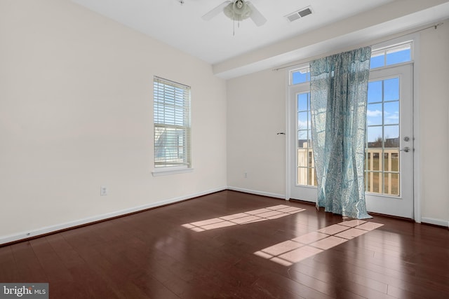 21552 Romans Dr, Ashburn, VA 20147 - spare room featuring wood-type flooring, healthy amount of natural light, and baseboards
