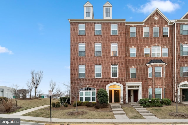 21552 Romans Dr, Ashburn, VA 20147 - view of property featuring brick siding