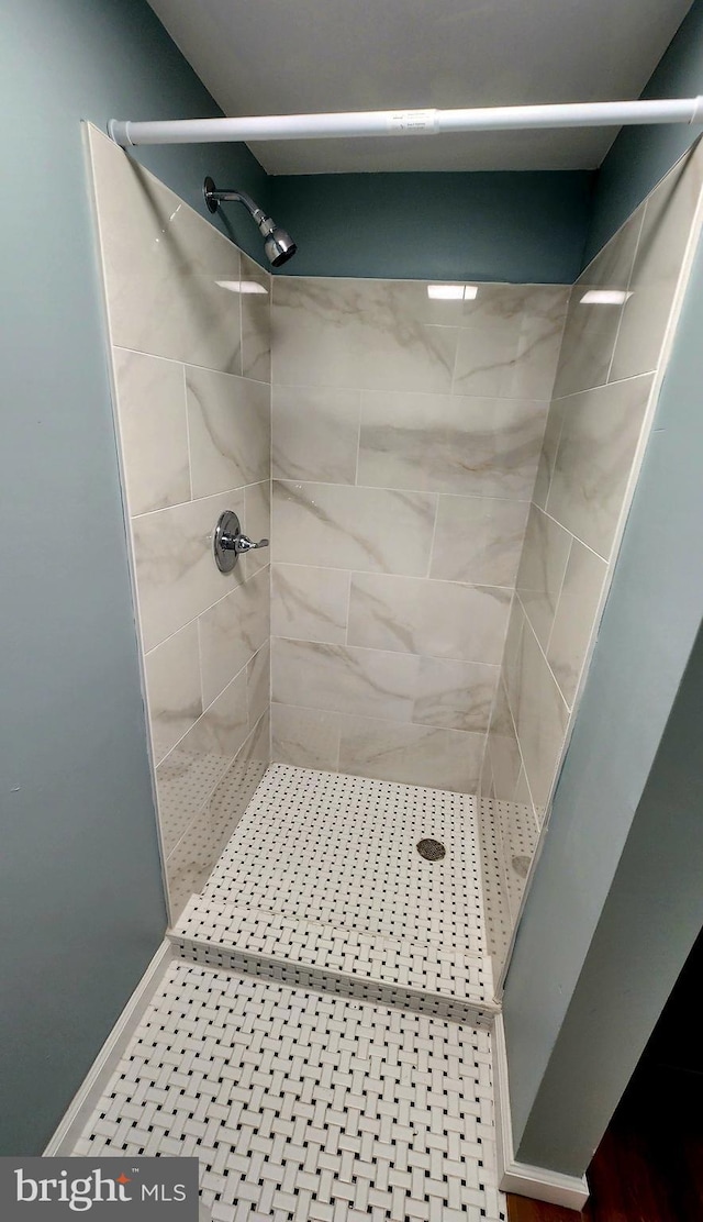 full bathroom with a stall shower