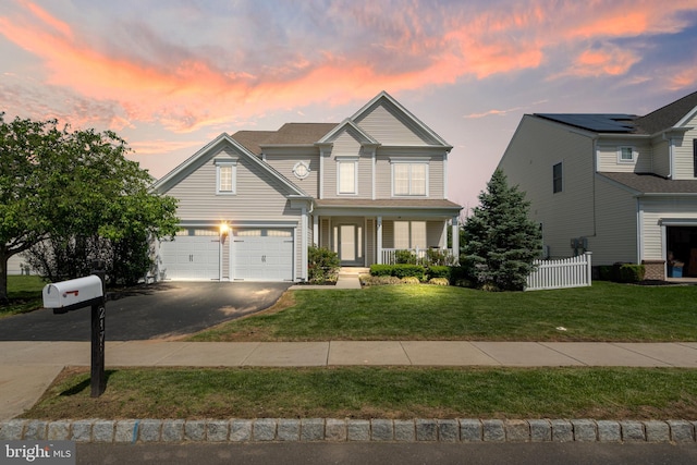 217 Liberty Trail Ct W, Fountainville, PA 18923 - view of front of property with driveway, a porch, and a garage