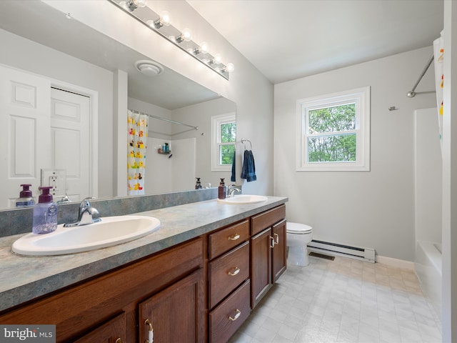 325 Chandler Dr, Shepherdstown, WV 25443 - bathroom with baseboard heating, toilet, double vanity, tile patterned floors, and baseboards
