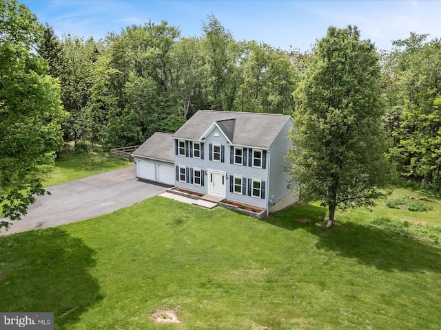 325 Chandler Dr, Shepherdstown, WV 25443 - colonial home featuring driveway, a front yard, and an attached garage