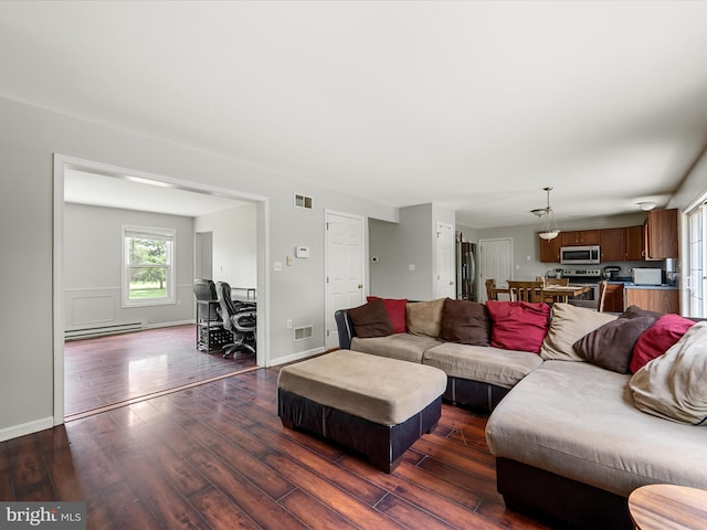 325 Chandler Dr, Shepherdstown, WV 25443 - living room featuring a baseboard radiator, dark wood-type flooring, and baseboards