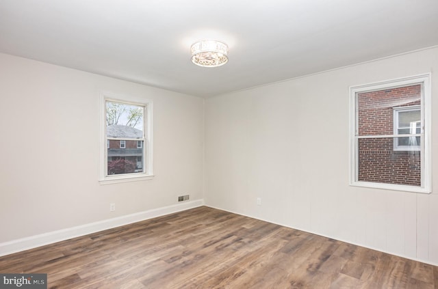 3010 Woodring Ave, Baltimore, MD 21234 - unfurnished room with wood finished floors and baseboards