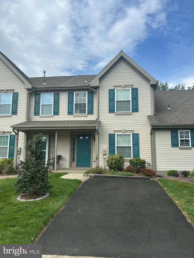 107 Tartan Ln, Hainesport, NJ 08036 - multi unit property with a front lawn, a porch, driveway, and roof with shingles