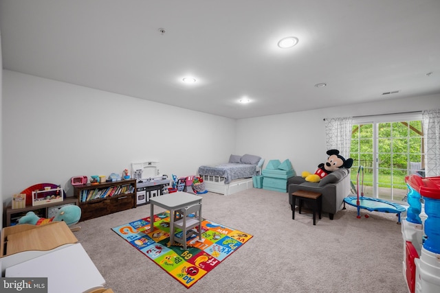playroom with carpet and recessed lighting