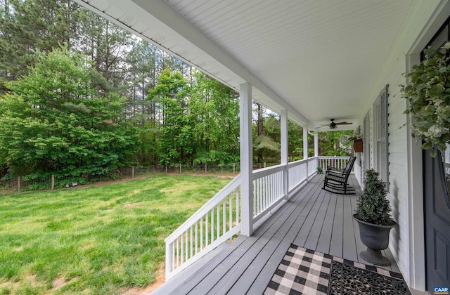deck featuring ceiling fan and covered porch