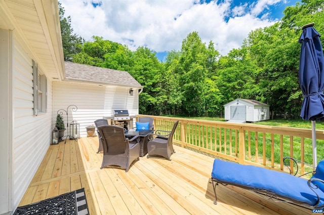 deck with a storage shed, an outdoor structure, outdoor dining area, and area for grilling