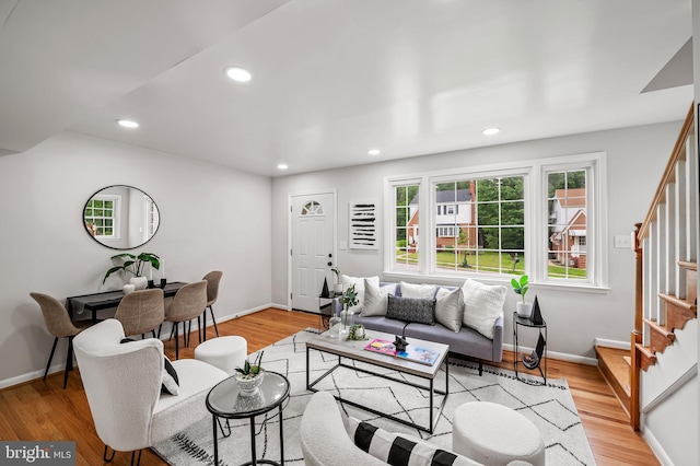 8226 Dorset Ave, Rosedale, MD 21237 - living area with stairs, light wood finished floors, recessed lighting, and baseboards