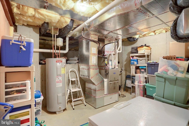 utility room featuring electric water heater and heating unit