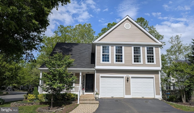 336 Deerpath Ave SW, Leesburg, VA 20175 - traditional-style house featuring driveway, covered porch, and a garage