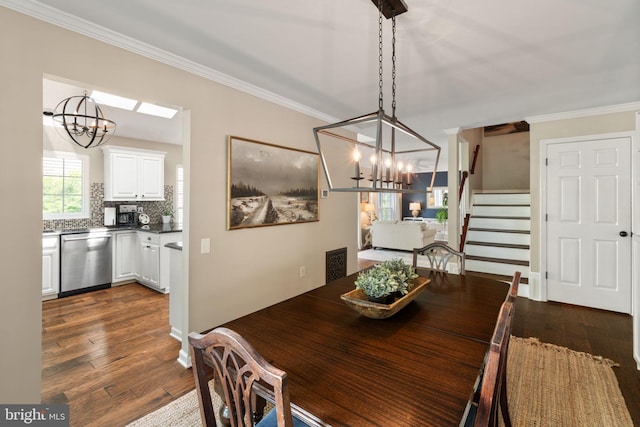 336 Deerpath Ave SW, Leesburg, VA 20175 - dining room with a chandelier, dark wood-style flooring, crown molding, stairway, and a skylight