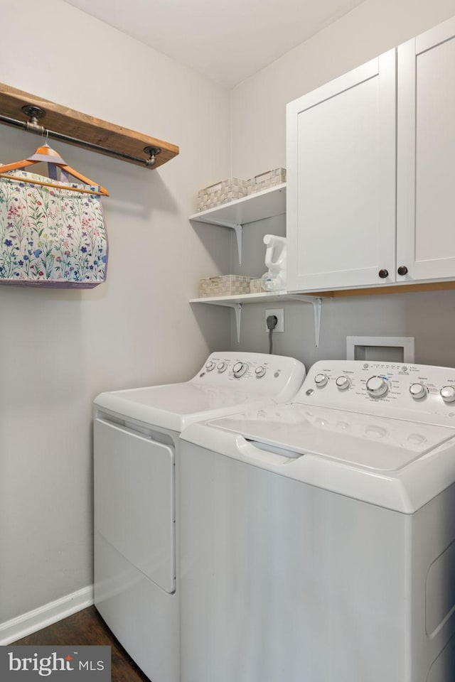 336 Deerpath Ave SW, Leesburg, VA 20175 - washroom featuring washing machine and clothes dryer, cabinet space, and baseboards