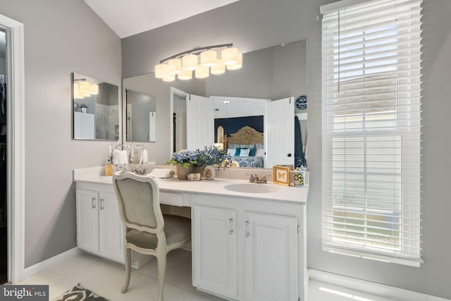 336 Deerpath Ave SW, Leesburg, VA 20175 - full bathroom featuring double vanity, healthy amount of natural light, ensuite bathroom, and tile patterned floors