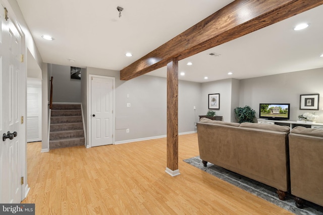 336 Deerpath Ave SW, Leesburg, VA 20175 - living room featuring light wood-style flooring, recessed lighting, beamed ceiling, stairs, and baseboards