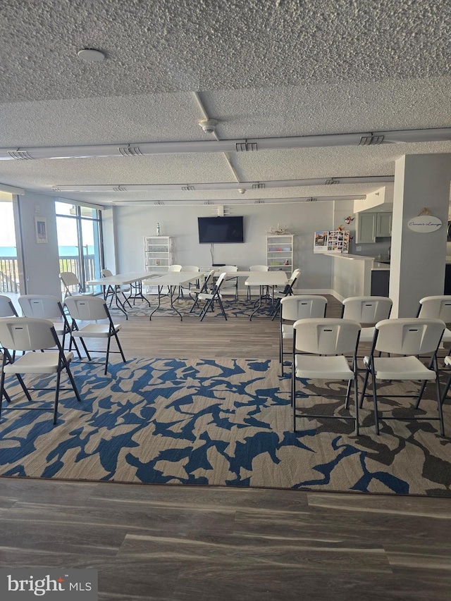 13100 Coastal Hwy Unit 1110, Ocean City, MD 21842 - living room featuring wood finished floors