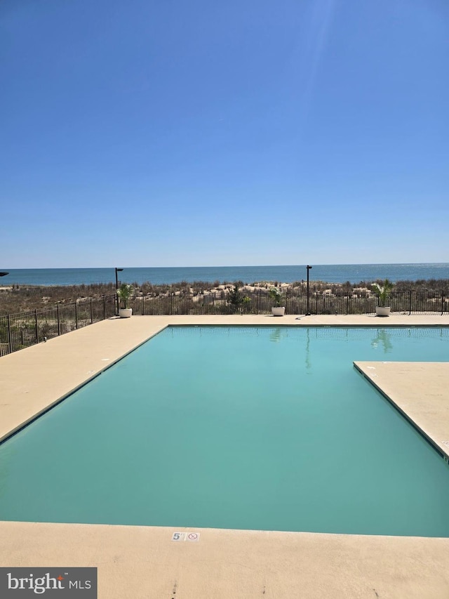 13100 Coastal Hwy Unit 1110, Ocean City, MD 21842 - community pool with fence and a water view