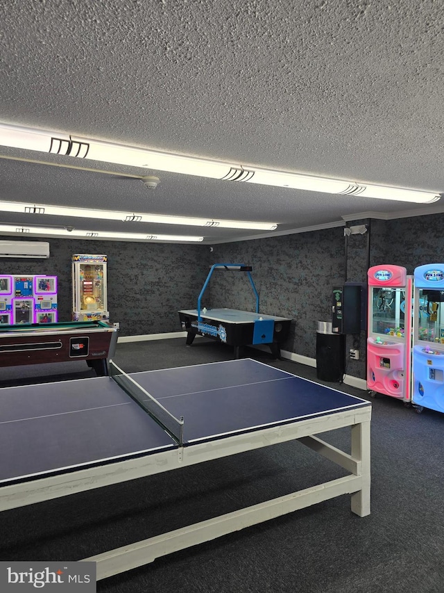 13100 Coastal Hwy Unit 1110, Ocean City, MD 21842 - playroom with a textured ceiling and a wall mounted air conditioner