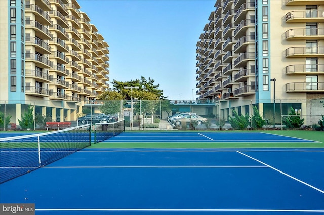 13100 Coastal Hwy Unit 1110, Ocean City, MD 21842 - view of tennis court featuring fence