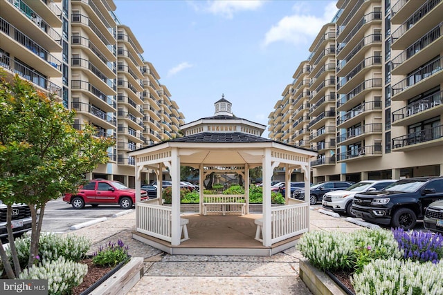 13100 Coastal Hwy Unit 1110, Ocean City, MD 21842 - uncovered parking lot with a gazebo