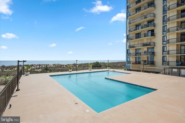 13100 Coastal Hwy Unit 1110, Ocean City, MD 21842 - community pool with a water view and a patio
