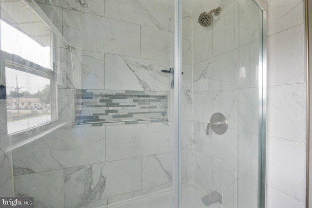 bathroom featuring a stall shower