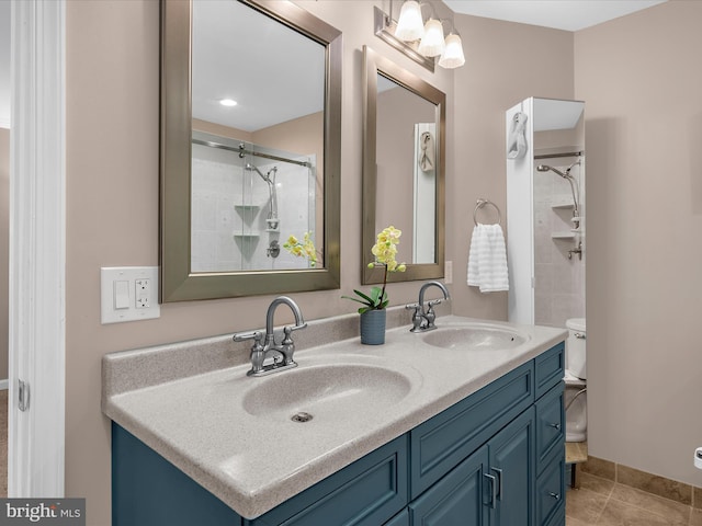 2039 Choptank Ave, Pasadena, MD 21122 - bathroom with a shower, double vanity, tile patterned flooring, and toilet