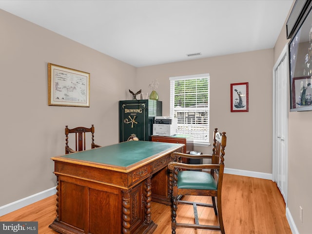 2039 Choptank Ave, Pasadena, MD 21122 - home office with light wood-style flooring and baseboards