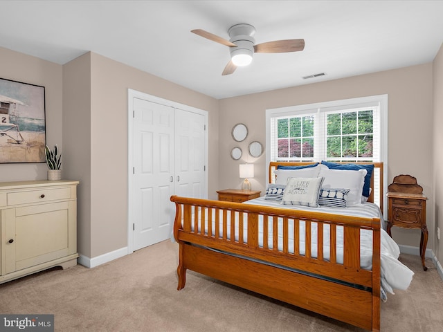 2039 Choptank Ave, Pasadena, MD 21122 - bedroom with light carpet, baseboards, a closet, and a ceiling fan