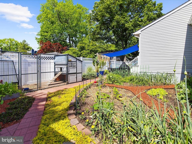 2039 Choptank Ave, Pasadena, MD 21122 - view of yard featuring a garden and a gate