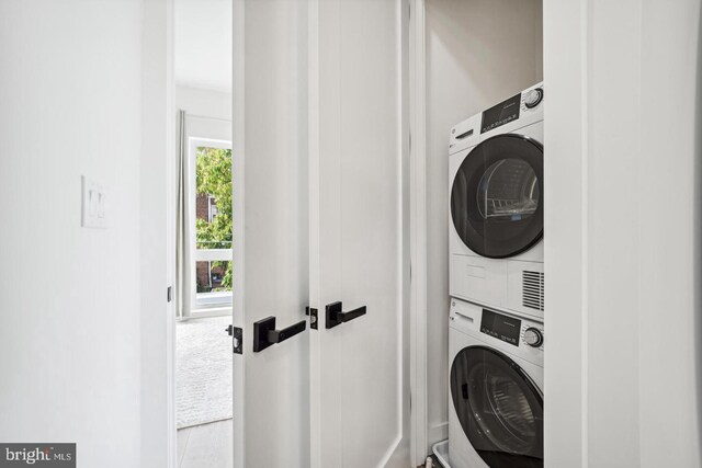 705 Quincy St NE Unit 5D, Washington, DC 20017 - laundry area featuring estacked washer and dryer