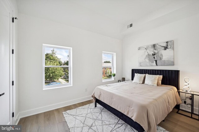 705 Quincy St NE Unit 5D, Washington, DC 20017 - bedroom featuring wood finished floors and baseboards