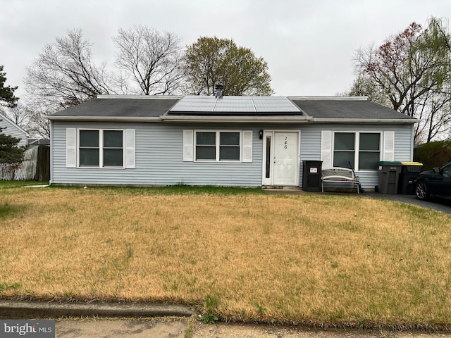 146 Diminish Dr, Newark, DE 19713 - single story home with roof mounted solar panels and a front yard