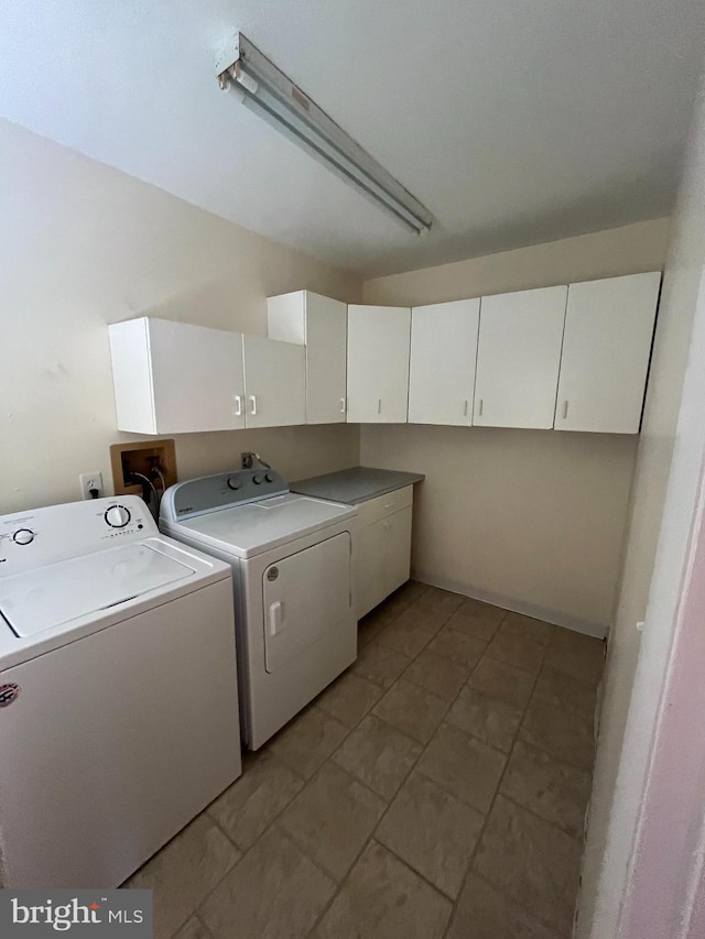 146 Diminish Dr, Newark, DE 19713 - washroom featuring cabinet space and washer and clothes dryer