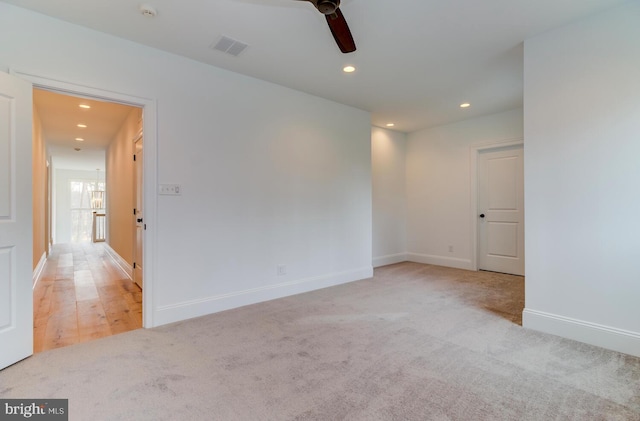 unfurnished room with recessed lighting, ceiling fan, carpet, and baseboards