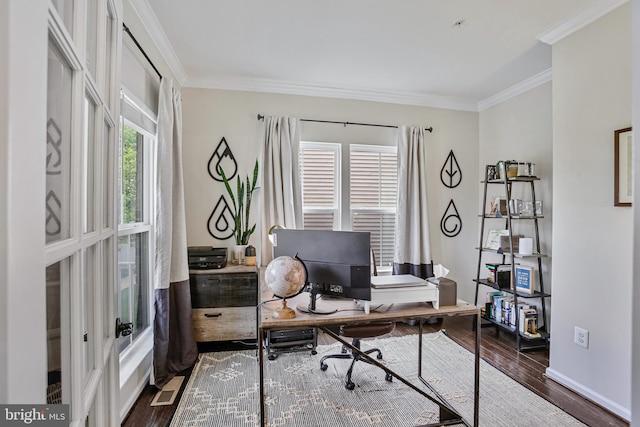 office space featuring dark wood-style floors, ornamental molding, and baseboards