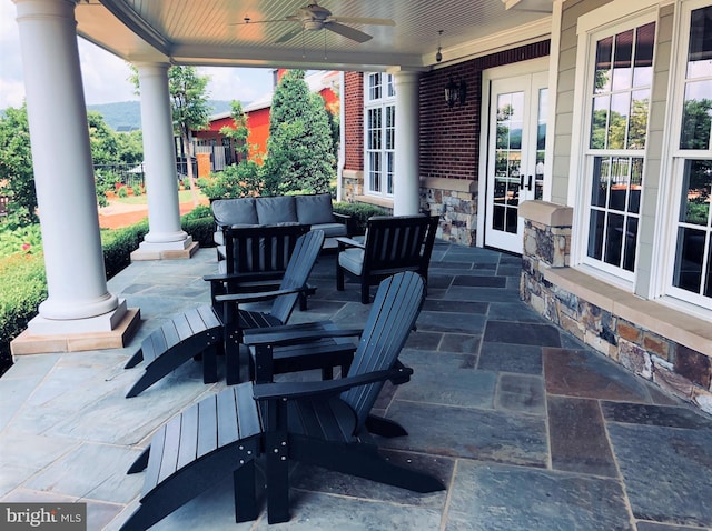view of patio / terrace with ceiling fan, an outdoor hangout area, and a porch