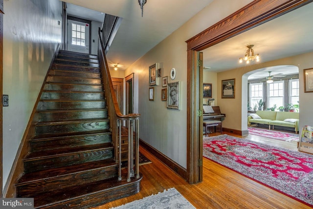 466 E Main St, Leola, PA 17540 - stairs featuring wood finished floors, healthy amount of natural light, arched walkways, and baseboards