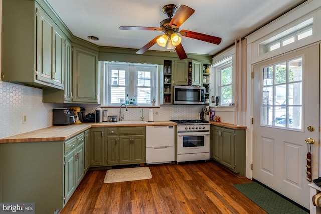 466 E Main St, Leola, PA 17540 - kitchen with white appliances, green cabinets, a sink, butcher block countertops, and healthy amount of natural light