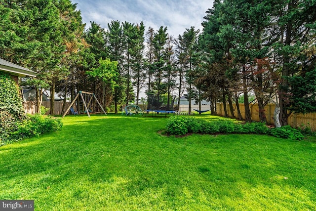 466 E Main St, Leola, PA 17540 - view of yard with a trampoline and a playground