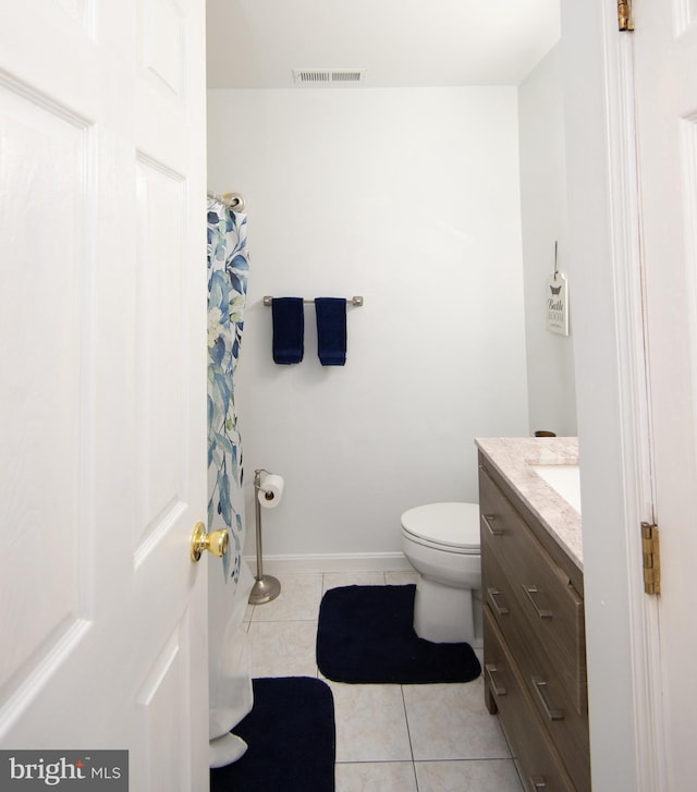 4906 Timbermarsh Ln, Woolford, MD 21677 - bathroom with tile patterned flooring, toilet, vanity, and baseboards