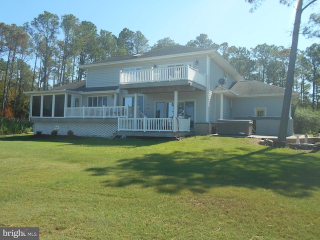4906 Timbermarsh Ln, Woolford, MD 21677 - rear view of house featuring a deck, a lawn, and a sunroom