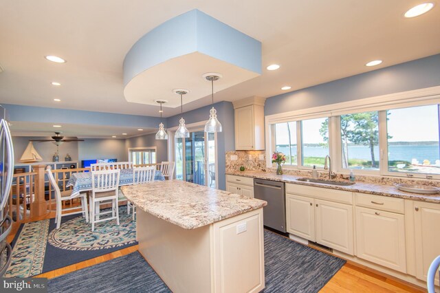 4906 Timbermarsh Ln, Woolford, MD 21677 - kitchen with dishwasher, a sink, light wood-type flooring, recessed lighting, and hanging light fixtures